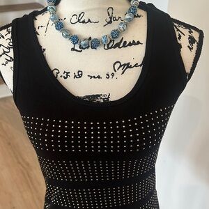 CALVIN KLEIN GOLD STUDDED TANK TOP. SIZE SMALL. LOTS OF STRETCH.